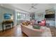 Comfortable living room featuring hardwood floors, soft pastel walls and natural light at 301 W 10Th St # 402, Charlotte, NC 28202
