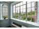 City view from window featuring lush greenery, residential area, and city buildings at 301 W 10Th St # 402, Charlotte, NC 28202