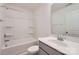 Bathroom featuring a gray vanity, white countertop, tub and shower combo at 3015 Howell Mill Rd, Charlotte, NC 28208