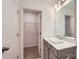 Bathroom featuring a gray vanity, white countertop and modern rectangular sink at 3015 Howell Mill Rd, Charlotte, NC 28208