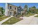 Charming townhomes featuring various colors and architectural details, enhancing curb appeal at 3015 Howell Mill Rd, Charlotte, NC 28208
