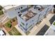 Aerial view of modern townhome featuring a rooftop patio and private outdoor space at 302 Wesley Heights Way, Charlotte, NC 28208