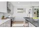 Well-designed kitchen featuring modern appliances, ample counter space, and stylish finishes at 302 Wesley Heights Way, Charlotte, NC 28208