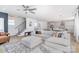 Open living area with modern decor, a stylish staircase, and a bright kitchen at 302 Wesley Heights Way, Charlotte, NC 28208