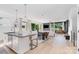 Bright, open floor plan with large windows, sleek finishes, and modern decor at 302 Wesley Heights Way, Charlotte, NC 28208