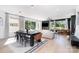 Stylish living area featuring modern decor, large windows, and an open layout at 302 Wesley Heights Way, Charlotte, NC 28208
