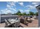 This rooftop patio has room to entertain with outdoor dining and seating at 302 Wesley Heights Way, Charlotte, NC 28208