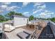 This rooftop patio has room to entertain with outdoor seating and sun loungers at 302 Wesley Heights Way, Charlotte, NC 28208