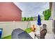 Fenced backyard with a patio, seating, grill, and minimal yard maintenance requirements at 306 Willow Wood Ct, Matthews, NC 28104