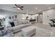 Open concept living space with luxury vinyl floors, neutral paint, and modern decor at 306 Willow Wood Ct, Matthews, NC 28104