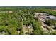 Aerial view of the home showing its location among trees and nearby roads at 308 Southland Rd, Huntersville, NC 28078