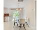 Bright dining area with a modern chandelier, with easy access to the kitchen at 308 Southland Rd, Huntersville, NC 28078