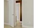 Hallway with neutral wall paint leading to several rooms at 308 Southland Rd, Huntersville, NC 28078