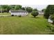A view of a well-maintained back yard and deck at 3124 Banks St, Lincolnton, NC 28092