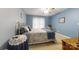 Cozy bedroom features a comfortable bed, and a ceiling fan at 3124 Banks St, Lincolnton, NC 28092