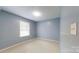 Bedroom with neutral walls, window, and carpet at 3124 Banks St, Lincolnton, NC 28092