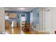 Charming dining area with hardwood floors and adjacent kitchen featuring stainless appliances at 3124 Banks St, Lincolnton, NC 28092