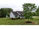 A well maintained ranch home with shutters and established landscaping at 3124 Banks St, Lincolnton, NC 28092
