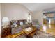 Inviting living area with hardwood flooring, comfortable seating, and easy kitchen access at 3124 Banks St, Lincolnton, NC 28092