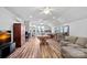 Large game room with a pool table, wet bar, seating area, TV and multiple ceiling fans at 327 Kenway Loop, Mooresville, NC 28117