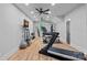 Home gym equipped with a treadmill, weightlifting equipment, and a TV for entertainment at 327 Kenway Loop, Mooresville, NC 28117