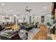 Open-concept living room seamlessly flows into the kitchen, offering a comfortable and stylish gathering space at 327 Kenway Loop, Mooresville, NC 28117