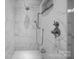 Luxurious walk-in shower with rainfall shower head, handheld sprayer, and stunning marble tile at 327 Kenway Loop, Mooresville, NC 28117