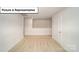Upstairs bonus room with neutral carpet perfect for an office, play room, or extra living space at 3404 Lacebark Ln, Gastonia, NC 28056