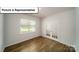 Versatile home office offers privacy with glass-paneled doors and a large window at 3404 Lacebark Ln, Gastonia, NC 28056