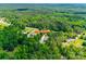 Extensive aerial view of the property with 4307 Edgeland Road address marker, surrounded by dense trees at 4307 Edgeland Rd, Edgemoor, SC 29712