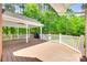 Large back deck perfect for entertaining with covered area and railing at 4307 Edgeland Rd, Edgemoor, SC 29712