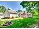 The backyard features a patio, a fire pit, and a detached garage at 4307 Edgeland Rd, Edgemoor, SC 29712