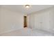 Spacious carpeted bedroom with double closets and a door leading to another room at 4307 Edgeland Rd, Edgemoor, SC 29712