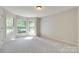 Bright bedroom with carpet, bay windows and natural light, creating a cozy and inviting space at 4307 Edgeland Rd, Edgemoor, SC 29712