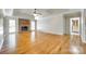 Spacious living room with hardwood floors, brick fireplace, and trey ceilings at 4307 Edgeland Rd, Edgemoor, SC 29712