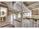 Open floor plan with vaulted ceilings, columns, and a stone fireplace, perfect for entertaining at 4307 Edgeland Rd, Edgemoor, SC 29712