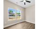 Sunlit bedroom showcases new windows, neutral walls, and wood-look flooring at 503 Eddleman Rd, Kannapolis, NC 28083