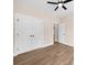 Bedroom featuring closet, ceiling fan, wood-look flooring, and neutral walls at 503 Eddleman Rd, Kannapolis, NC 28083
