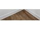 Close-up of attractive wood-look flooring and modern base trim at 503 Eddleman Rd, Kannapolis, NC 28083