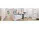 Kitchen with granite countertops, stainless steel dishwasher and sink, white cabinets, and open layout at 503 Eddleman Rd, Kannapolis, NC 28083