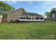 View of a large deck in a spacious backyard, perfect for outdoor entertaining at 5050 Forest Ridge Dr, Hickory, NC 28602