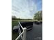 Outdoor deck with a hot tub and seating area, perfect for relaxation and entertainment at 5050 Forest Ridge Dr, Hickory, NC 28602