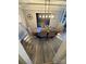 Dining room with a wooden table set for four under a modern light fixture at 5050 Forest Ridge Dr, Hickory, NC 28602