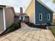 Charming exterior features a stone chimney and entryway that leads to a blue front door, offering inviting curb appeal at 5050 Forest Ridge Dr, Hickory, NC 28602