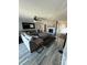 Cozy living room featuring a stone fireplace and modern decor at 5050 Forest Ridge Dr, Hickory, NC 28602