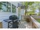 Cozy back deck with a grill, perfect for outdoor entertaining and relaxing at 56 Blume Sw Ave, Concord, NC 28025