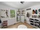 Bright bedroom with hardwood floors, featuring a large window and ample storage and accessories at 56 Blume Sw Ave, Concord, NC 28025