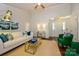 Cozy living room showcasing an open layout, hardwood floors, and large windows at 5916 Rexwood Pl, Charlotte, NC 28210