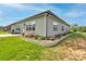 Charming home boasts a well-maintained yard with a patio and beautiful landscaping at 604 Airport Rd, Kannapolis, NC 28081