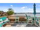 Inviting balcony with outdoor seating overlooking a serene lake view at 657 Portside Dr, Davidson, NC 28036